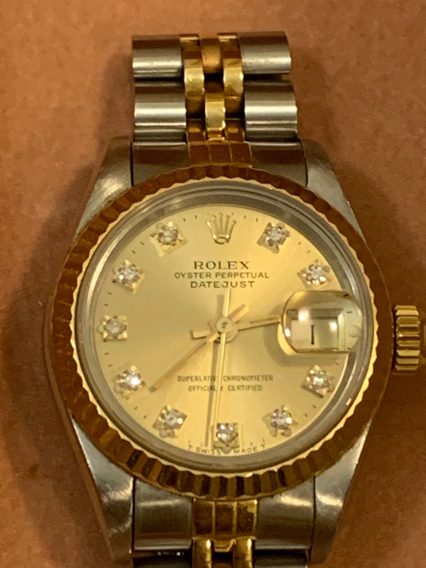 Rolex Oyster Perpetual Datejust 69173 Lady 26mm 18k Gold and Steel Watch Champagne Diamond Dial