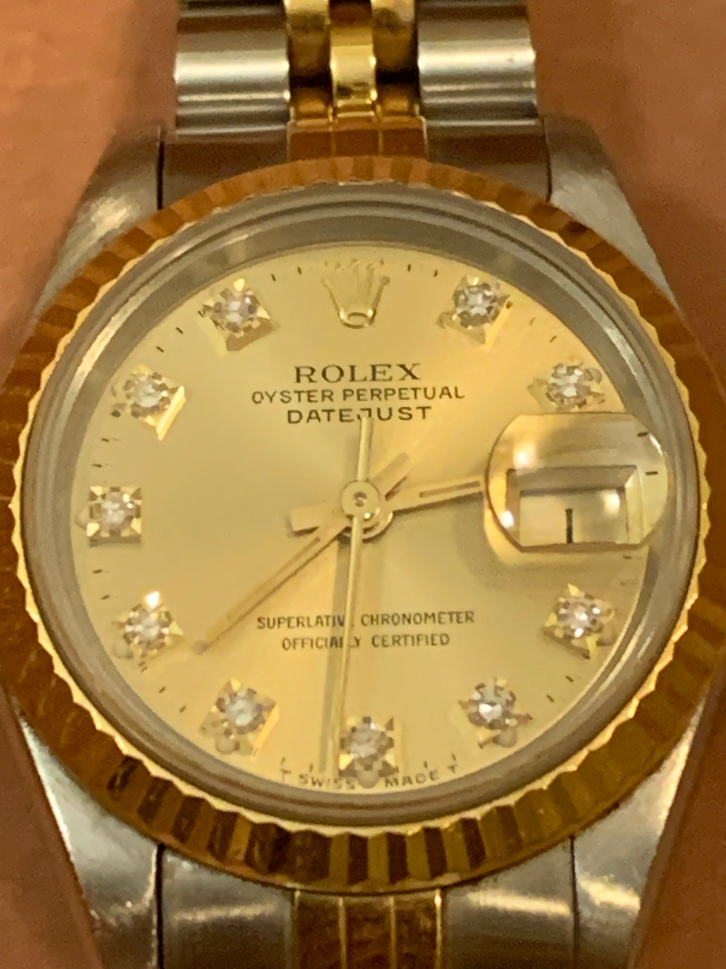 Rolex Oyster Perpetual Datejust 69173 Lady 26mm 18k Gold and Steel Watch Champagne Diamond Dial