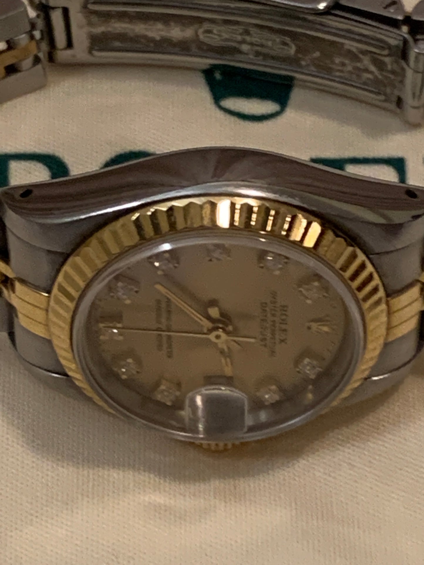 Rolex Oyster Perpetual Datejust 69173 Lady 26mm 18k Gold and Steel Watch Champagne Diamond Dial