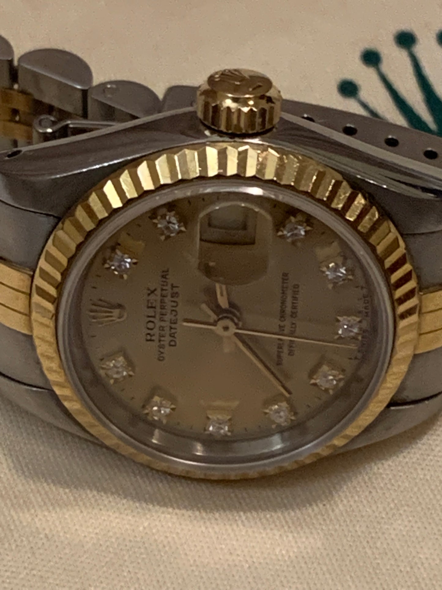 Rolex Oyster Perpetual Datejust 69173 Lady 26mm 18k Gold and Steel Watch Champagne Diamond Dial